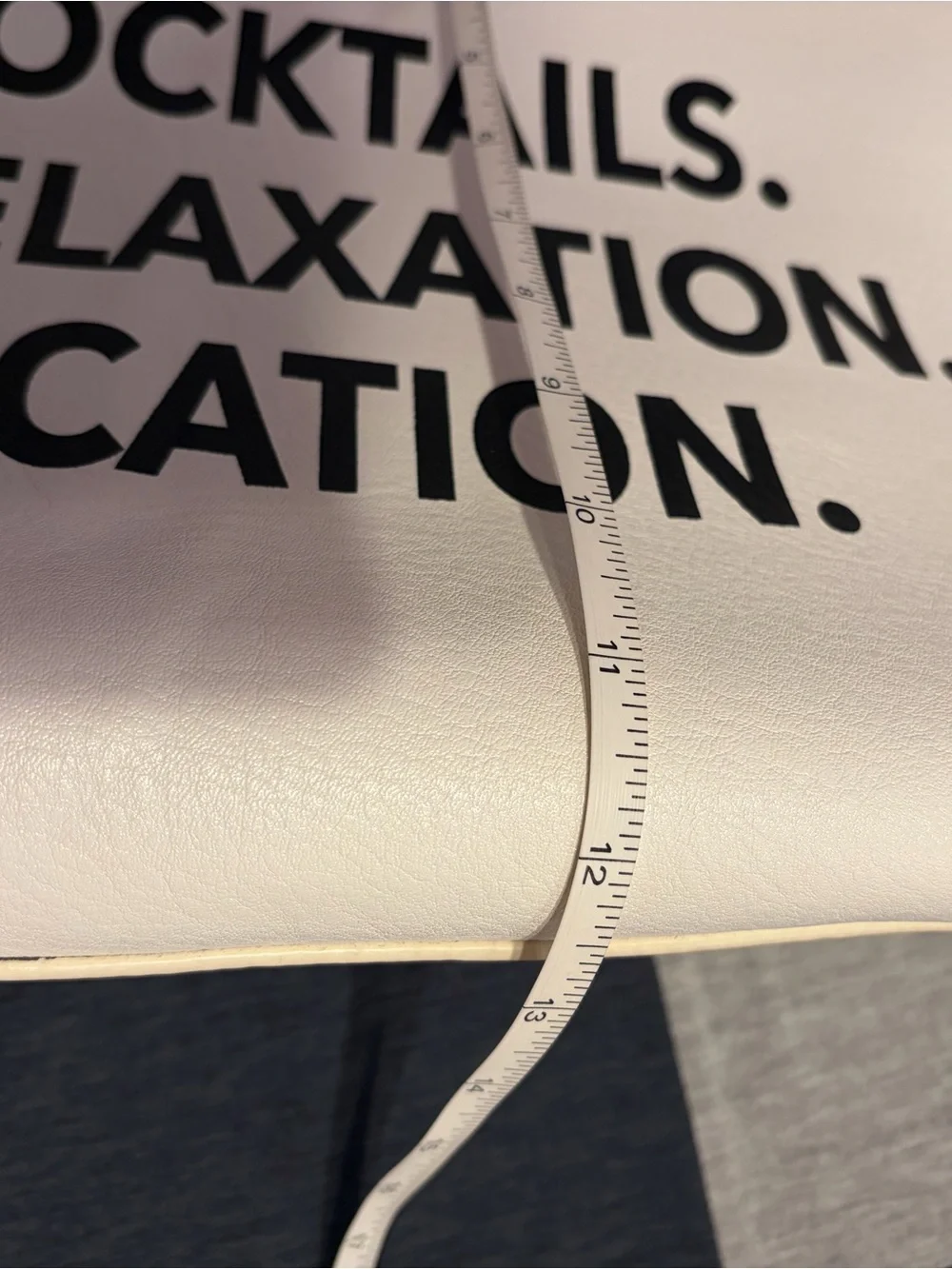 White Tote Bag with Black Handles and Bold Black Text